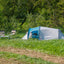 Open ingang van de Coleman Cortes 3 tent, met ruime voortent en ventilatieopties