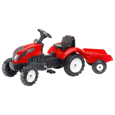 Kind rijdt op de Falk Country Farmer traptractor in de tuin.